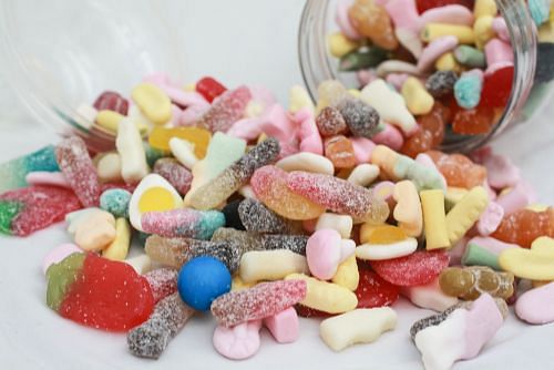 A selection of sugary Pick N Mix colourful sweets on display Stock Photo -  Alamy